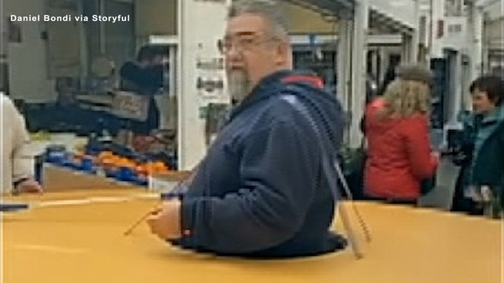 Man in Italy wears social-distancing 'doughnut'