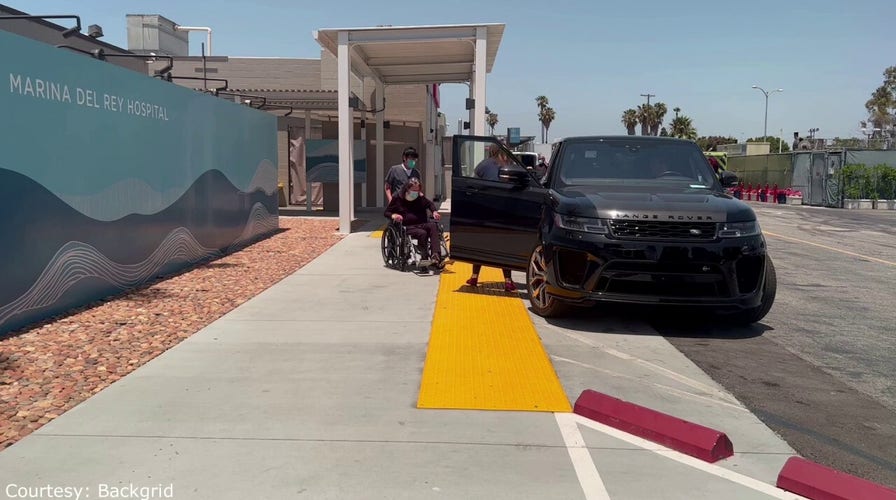 Ozzy Osbourne on ‘road to recovery’ as he leaves hospital in a wheelchair with wife Sharon following ‘major operation’