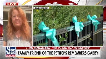Teal ribbons placed around Gabby Petito's hometown