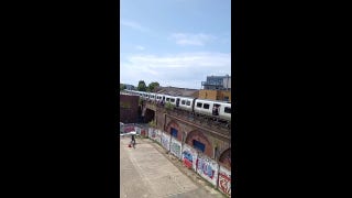 Passengers stuck on hot train receive gift from delivery driver