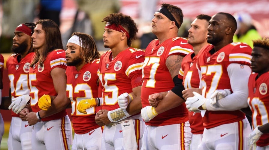 Chiefs take field for the national anthem, 'Lift Every Voice and Sing';  Texans stay in locker room