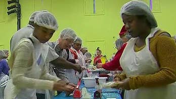 Thousands of volunteers help prepare meals for those in need