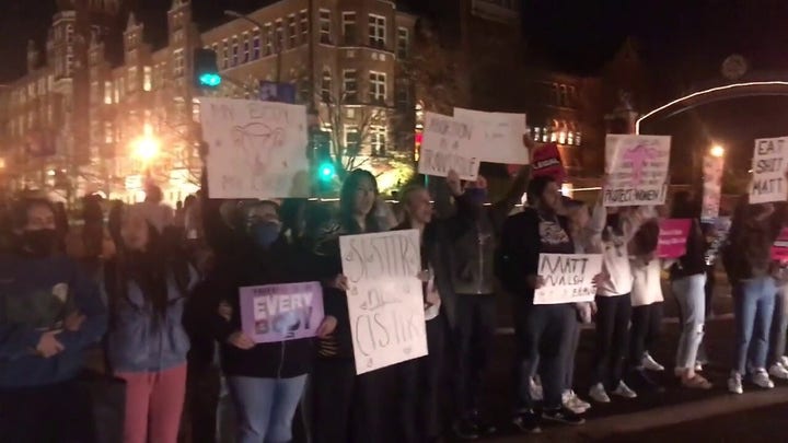 Protesters block street outside conservative commentator’s speech in near Saint Louis University