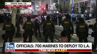 Rioters standoff with law enforcement in Santa Ana