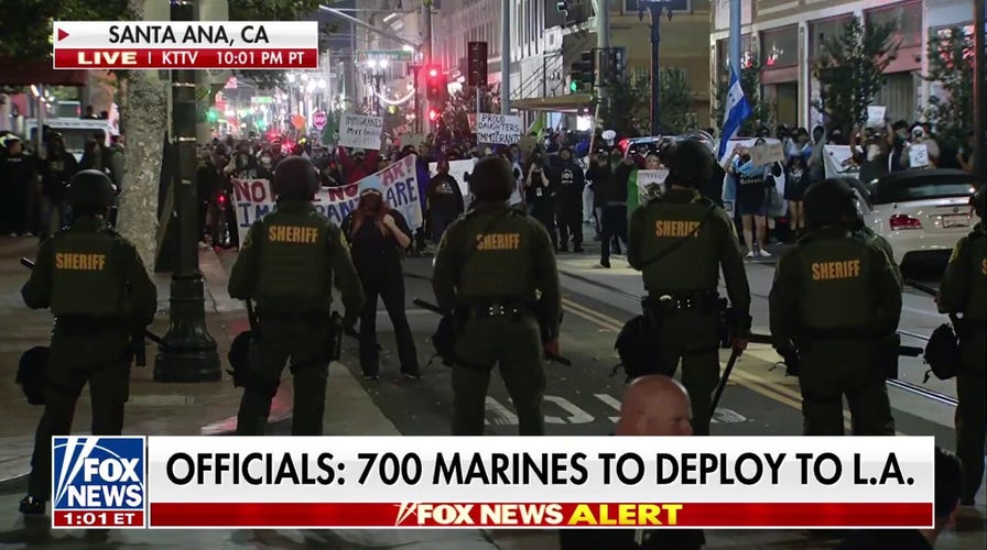 Rioters standoff with law enforcement in Santa Ana