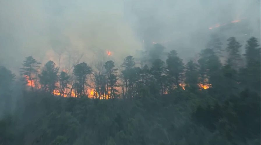 New Jersey wildfire grows to 2,500 acres, threatening structures and