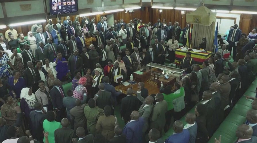 Ugandan lawmakers sing after passing Anti-Homosexuality Act