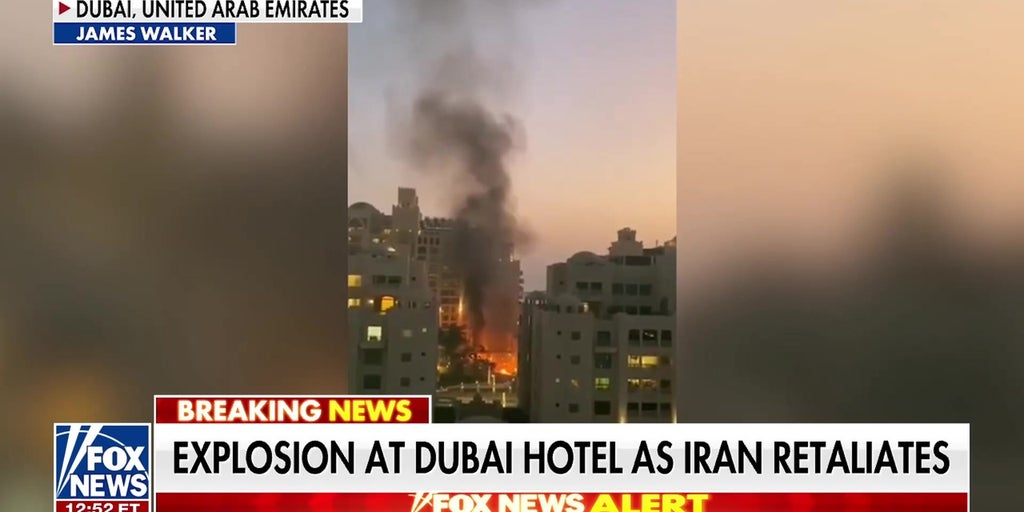 Fiery explosion at Dubai hotel after Iranian missile strike