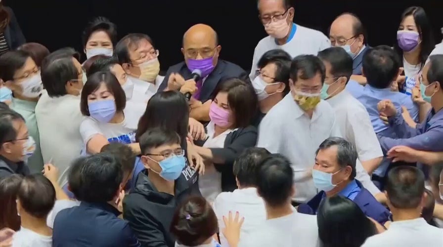 Taiwan lawmakers brawl over government’s handling of COVID pandemic