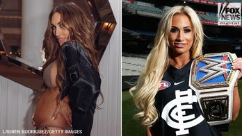 WWE star struts Miami catwalk while pregnant