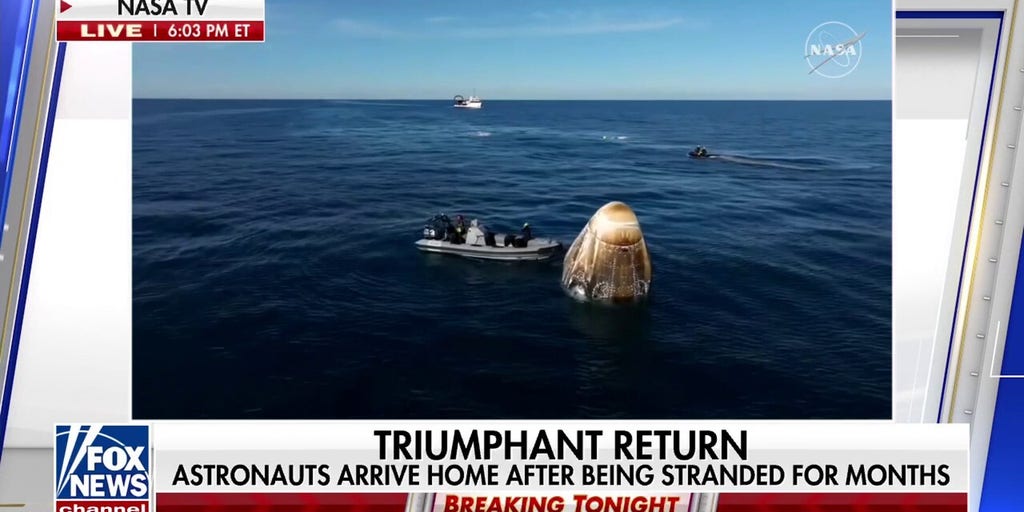 Crews tend space capsule containing stranded astronauts after splashdown
