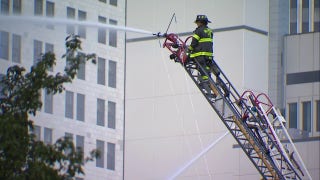 Baltimore Fire Department battles massive downtown blaze