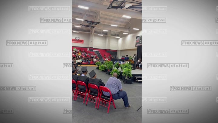 An 85-year-old walks across the high school graduation stage in Georgia
