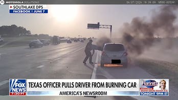 Texas officer pulls driver from burning car in dramatic bodycam rescue