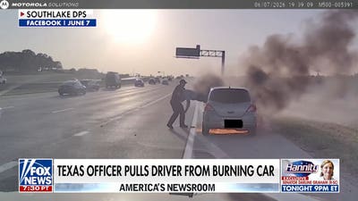 Texas officer pulls driver from burning car in dramatic bodycam rescue