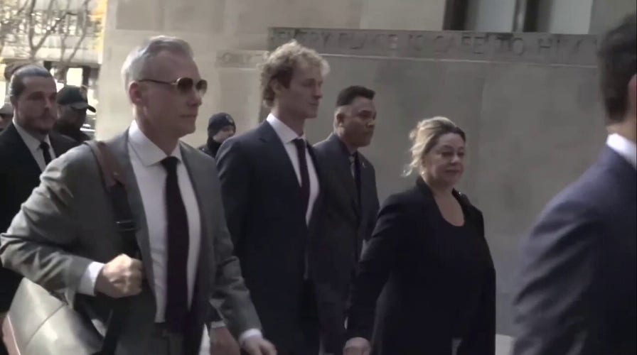 Protesters condemn Marine vet before chokehold trial goes to jury