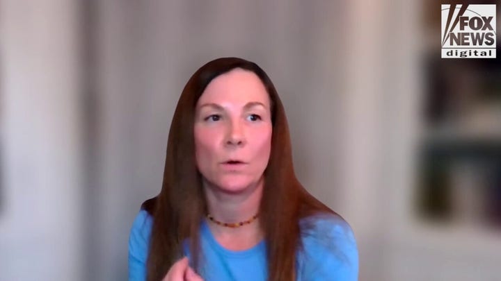 Swimmer claims grievance has been filed against her for calling trans athlete 'a man'