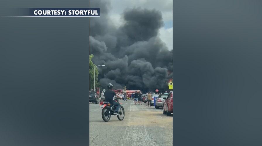 Plumes of smoke seen after plane crashes in Southern California neighborhood
