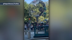 Climate change protesters climbing Columbus Circle globe in NYC are arrested, charged