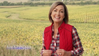 Iowa Governor Kim Reynolds dropped a new six-figure ad buy saying Iowans still know 'boys from girls'