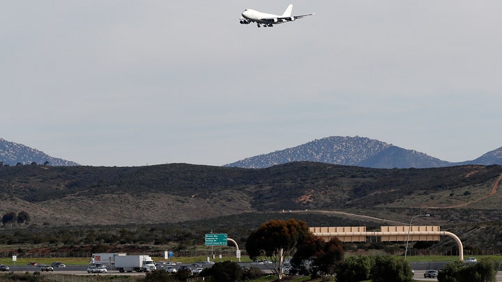 Plane carrying evacuees from the coronavirus outbreak in China lands at Marine Corps Station Miramar