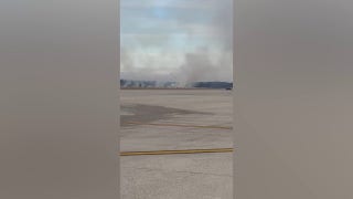 Brush fire started by United flight departing from Washington, DC, area
