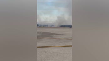 Brush fire started by United flight departing from Washington, DC, area