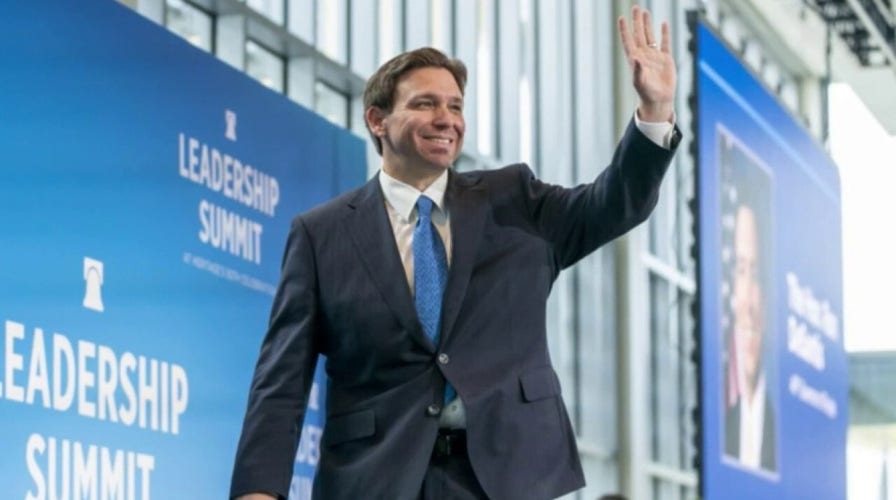 Protesters gather outside DeSantis donor meeting in Miami