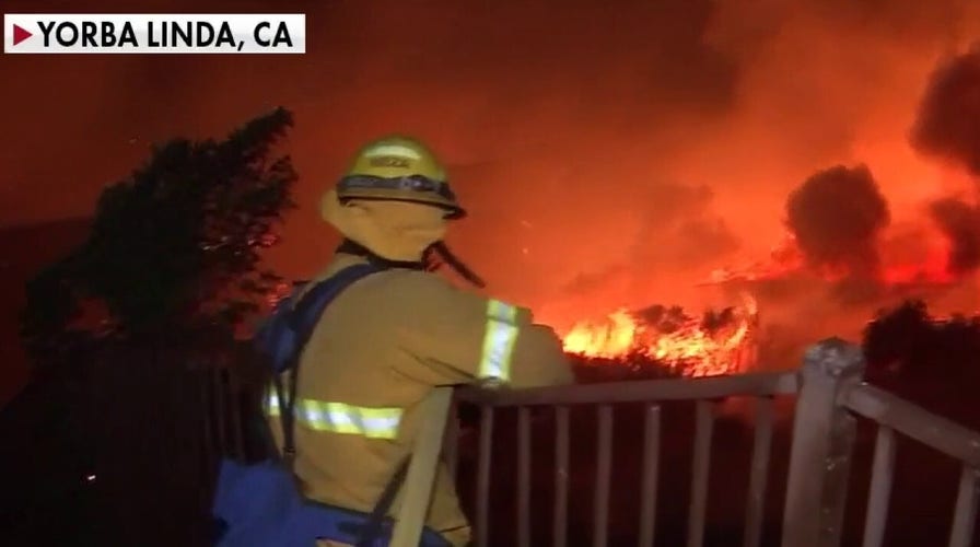 Fast-moving wildfires force evacuations in Southern California