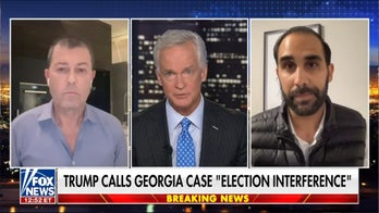 Georgia grand jury indicts Trump, 18 others in election case 