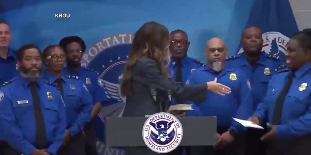 Noem hands out bonus checks to Houston TSA employees who worked during government shutdown