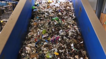 Recycling robots use AI to sort waste 24-7