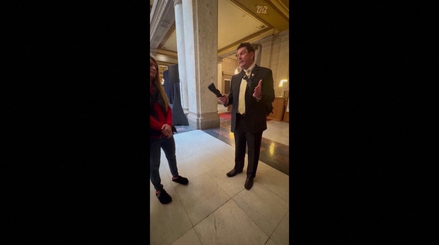 Indiana state Rep. Jim Lucas flashes firearm to pro-gun control students