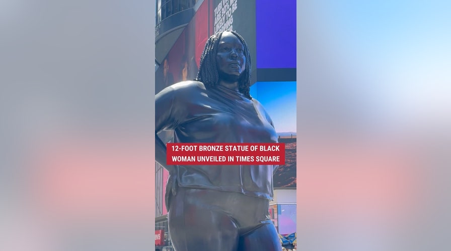 NEW LOOK?: A 12-foot bronze statue of a Black woman was unveiled in Times Square, designed to "contrast" the two existing statues of White men already on display