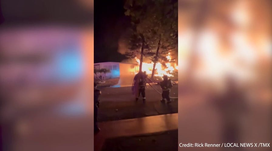 Florida mobile home park erupts into flames after small plane crash