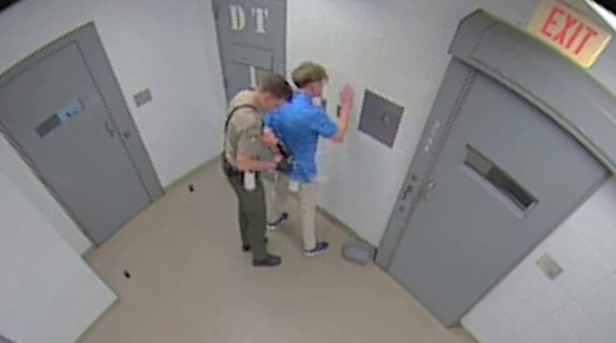 Devil’s Den murder suspect arrives at Washington County Sheriff’s Office in shackles