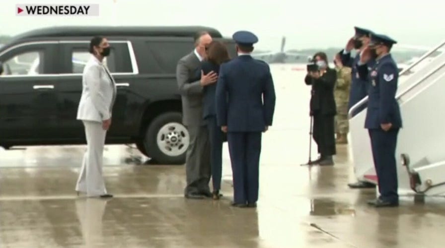 Kamala Harris, Second Gentleman kiss while wearing masks