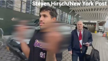 Illegal migrant flips middle fingers after being charged with attacking NYPD in Times Square