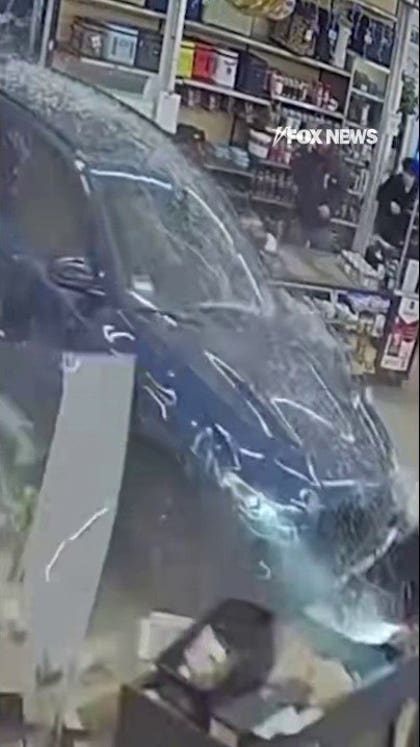 NEAR MISS: Vehicle crashes through the front of a hardware store