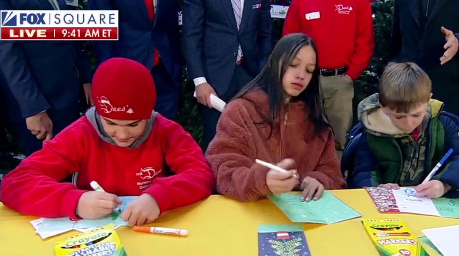 DHL delivers Christmas trees, cards to troops with Operation Holiday Cheer