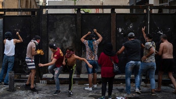 Protesters clash with police outside Lebanese parliament