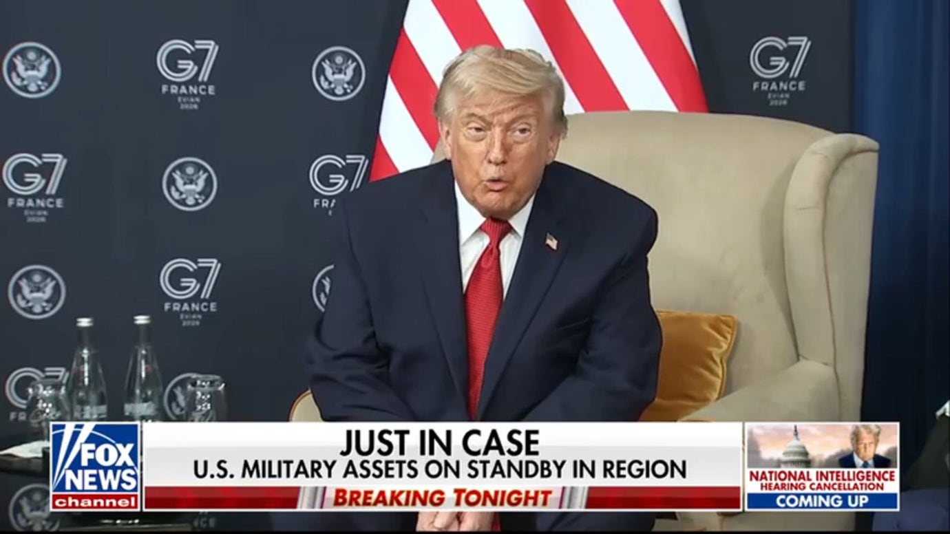 President Trump signs copy of Iran deal during dinner at Versailles