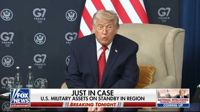 President Trump signs copy of Iran deal during dinner at Versailles