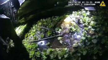 Florida police rescue man from submerged car in murky canal