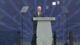 Biden stands alone on stage of Obama's Presidential Center in awkward moment