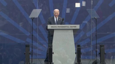 Biden stands alone on stage of Obama's Presidential Center in awkward moment