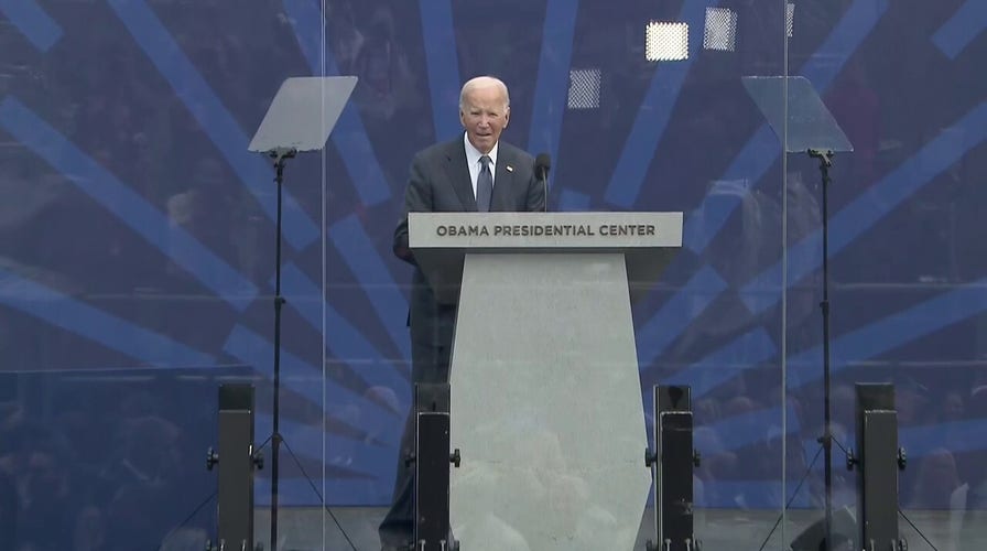 Biden stands alone on stage of Obama's Presidential Center in awkward moment