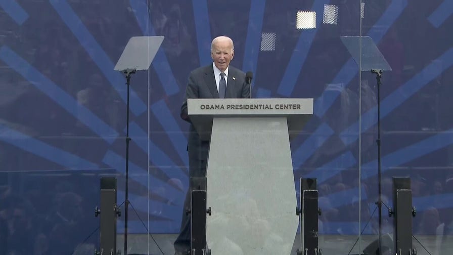 Biden stands alone on stage of Obama's Presidential Center in awkward moment