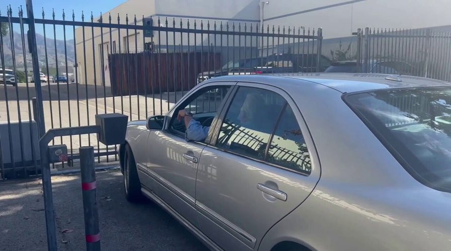 Leno seen behind the wheel for first time after being released from hospital