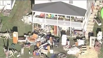 Massive flooding forces evacuations in after dam fails in Michigan	